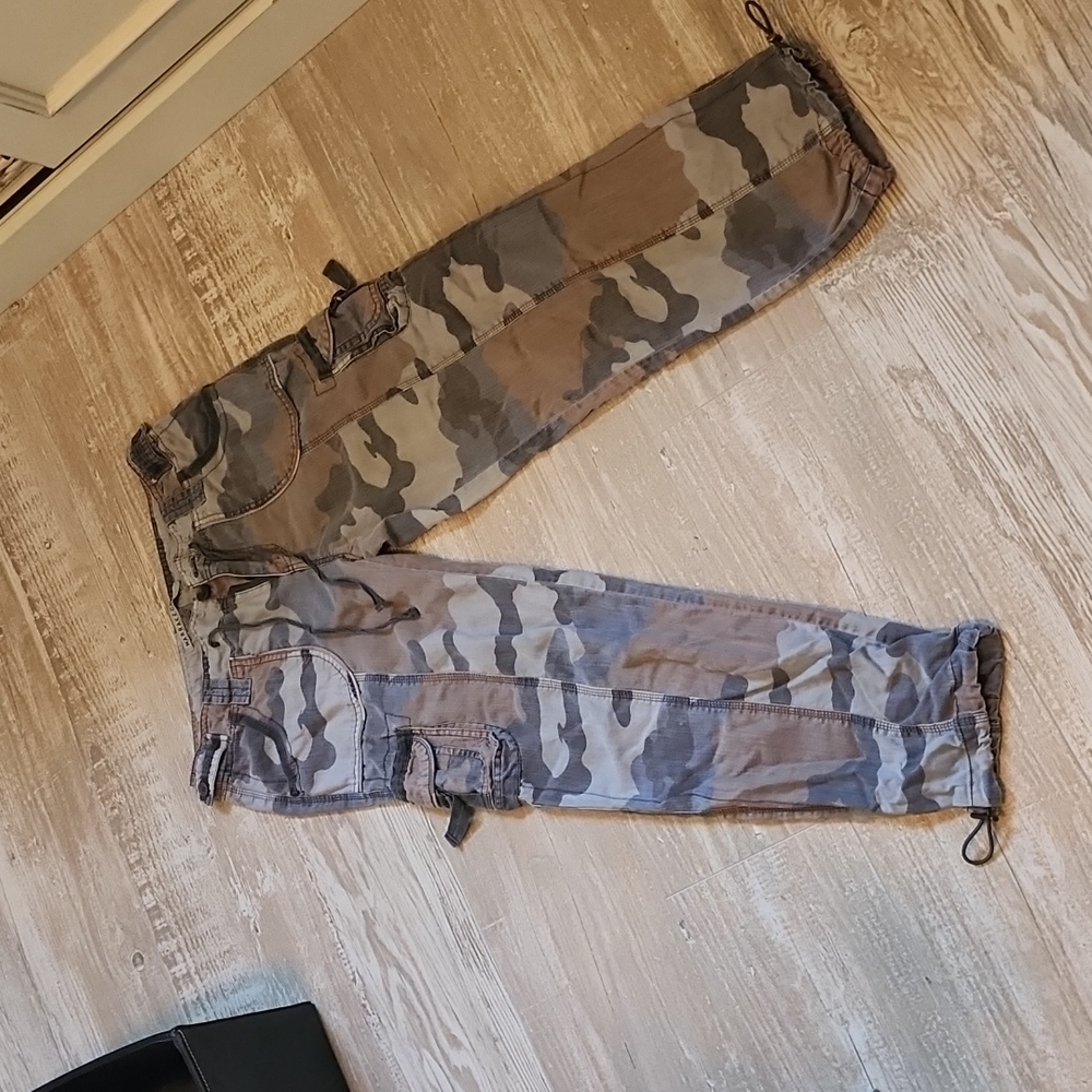 Camouflage cargo pants size 28 waist, meduim size.